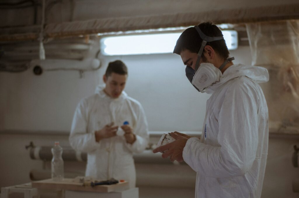 Man standing near another man