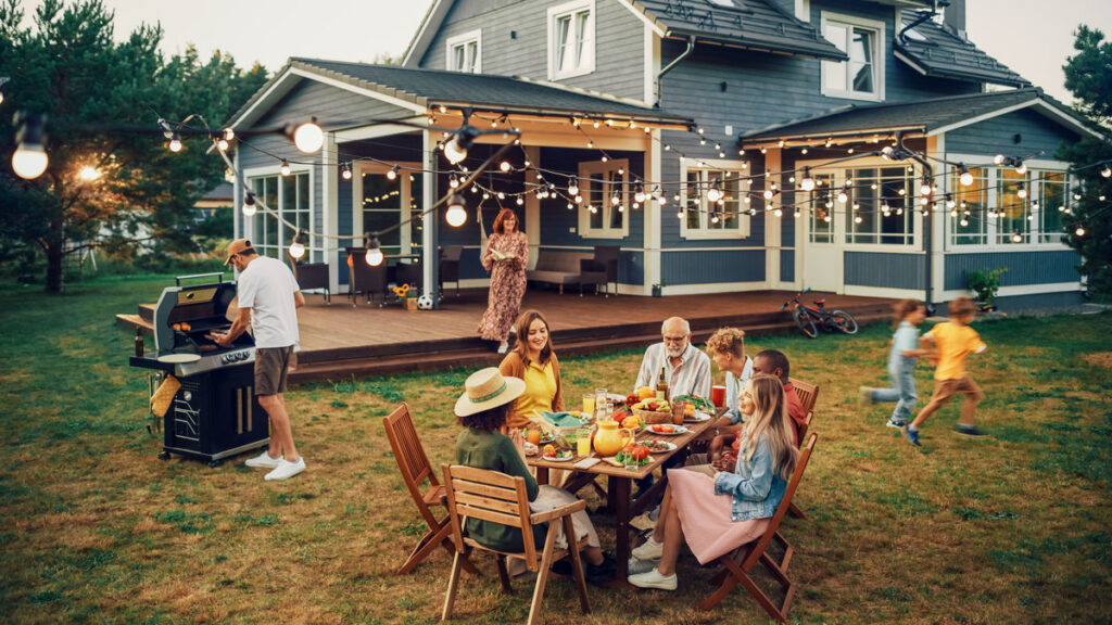 Big Family and Friends Celebrating Outside at Home. Diverse Grou